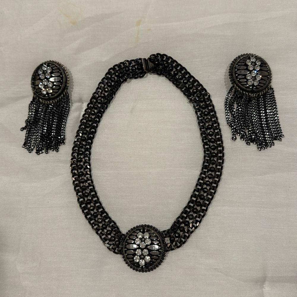 Black necklace with matching clip on earrings